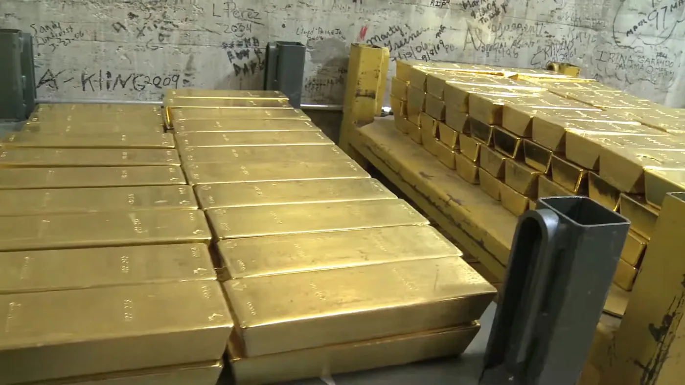 Gold bars representing XAUUSD EA and gold trading robot market context